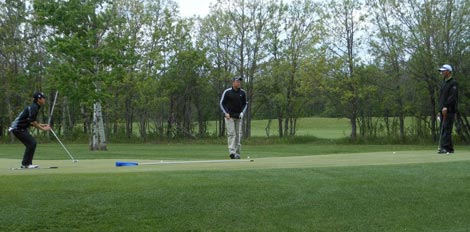 Men's League in golfing on the greens at Lorette Golf Course